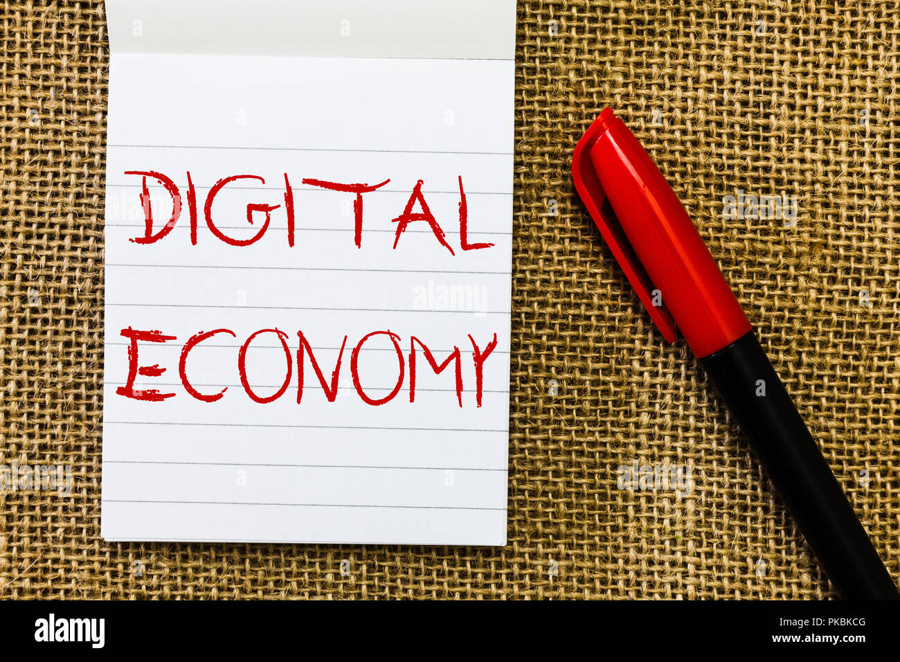 Handwriting text Digital Economy. Concept meaning worldwide network of