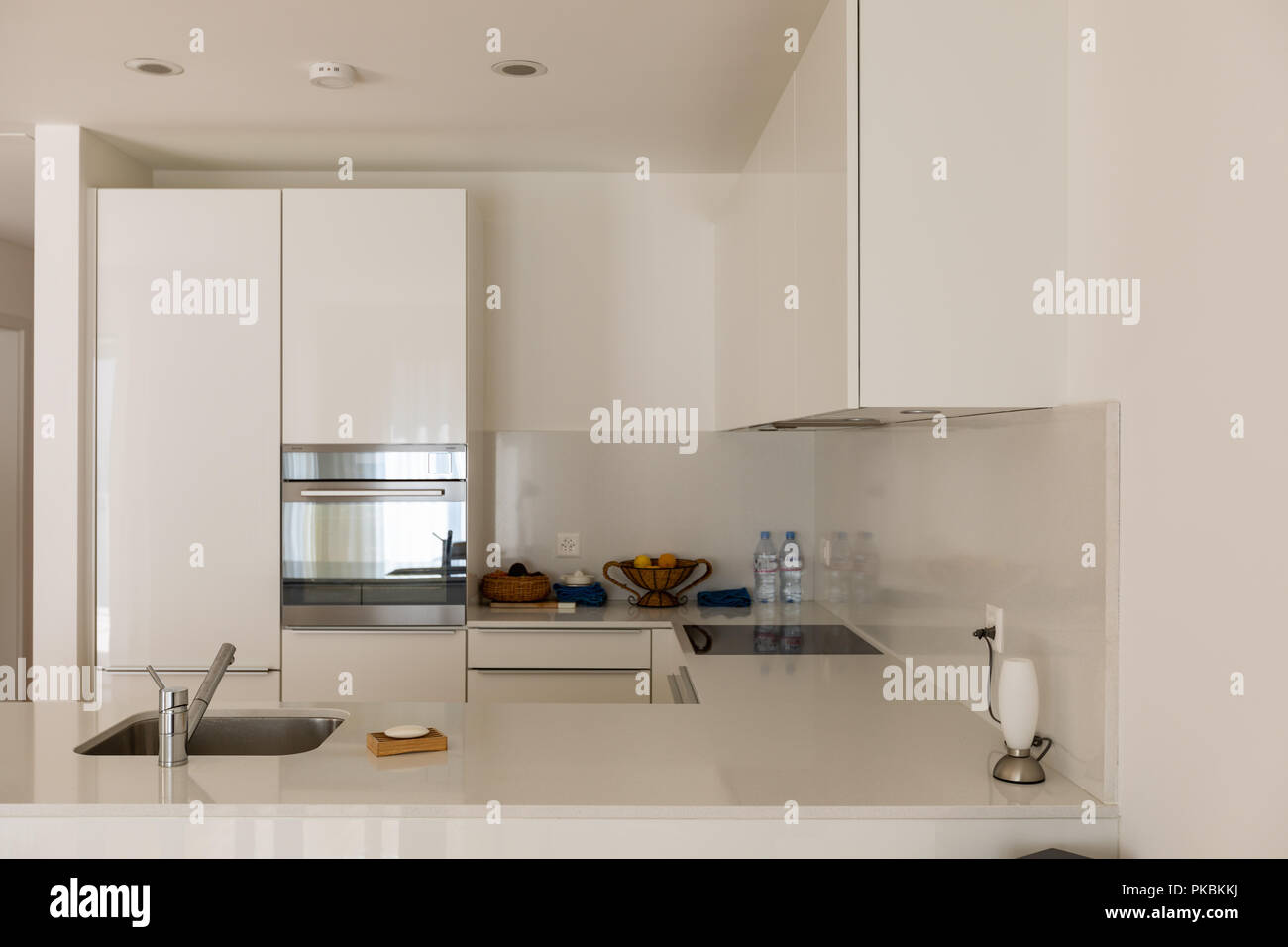 Detail of a modern kitchen, no color just white Stock Photo