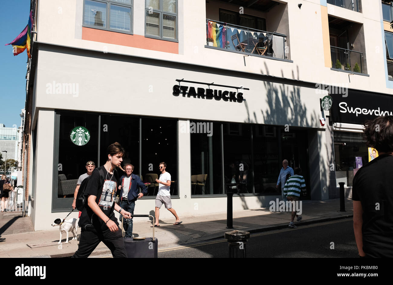 Recently opened Starbucks coffee house cafe in St James's Street Kemp Town Brighton Photograph taken by Simon Dack Stock Photo