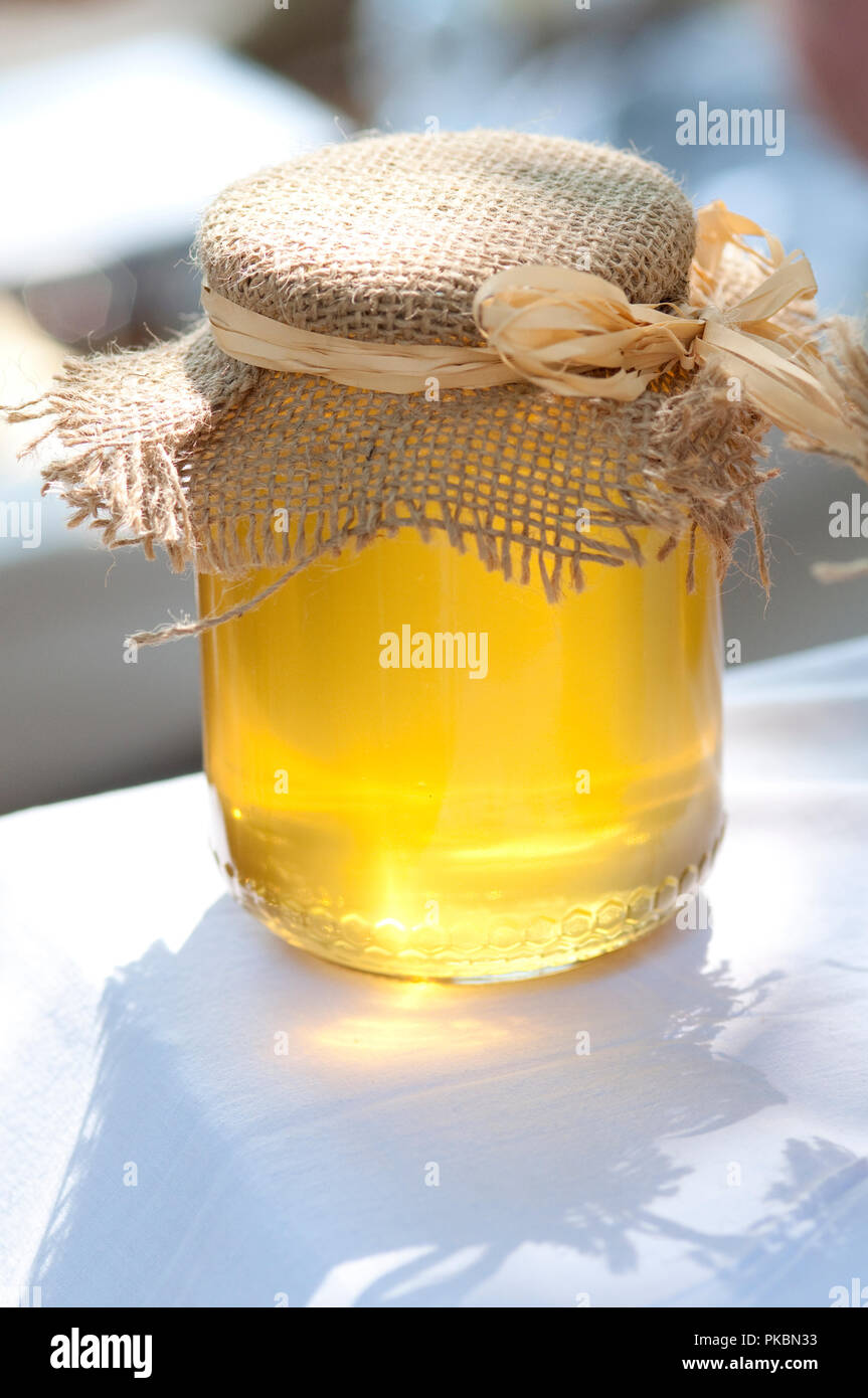 Honey in Glass Jar Stock Photo Alamy
