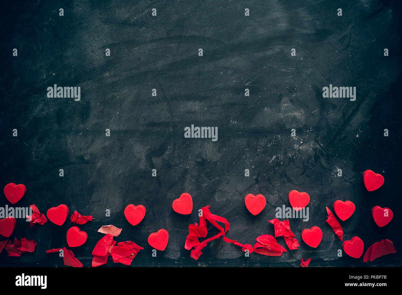 lots of little red hearts on black background. romantic love background for  Valentine's day, birthday, party, wedding Stock Photo - Alamy