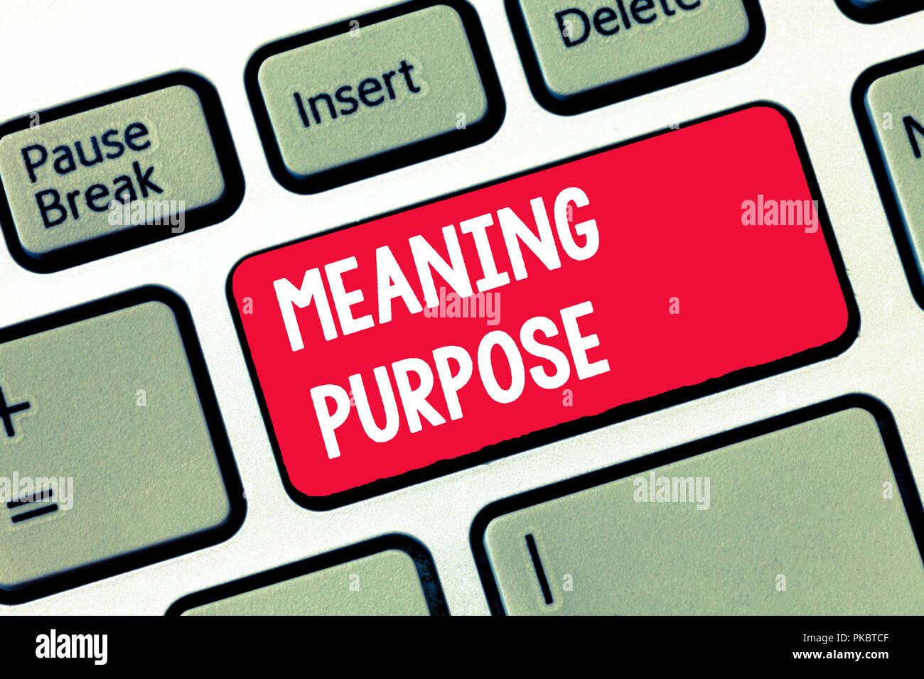 Handwriting text writing Meaning Purpose. Concept meaning The reason for which something is done or created and exists. Stock Photo