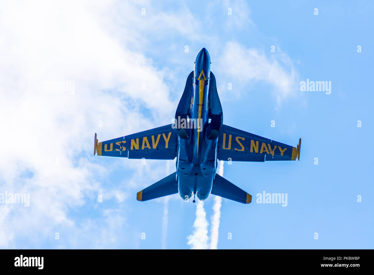 One of the F/A18 fighter jets of The Blue Angels, flies low