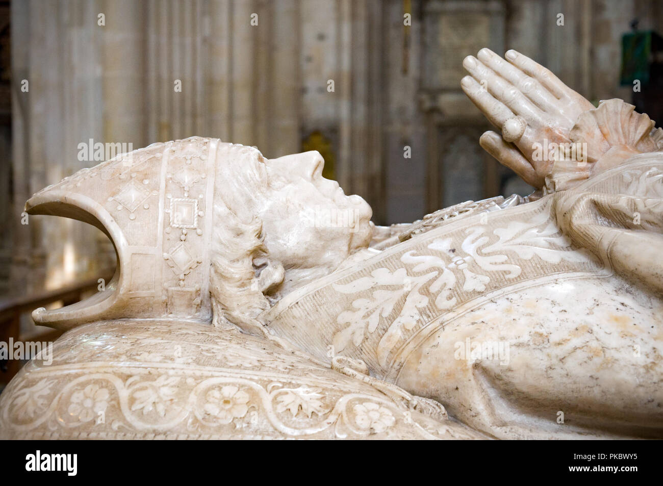 The face and hands of the tomb of Bishop Edward Harold Browne, Winchester Cathedral, Hampshire, England, UK Stock Photo