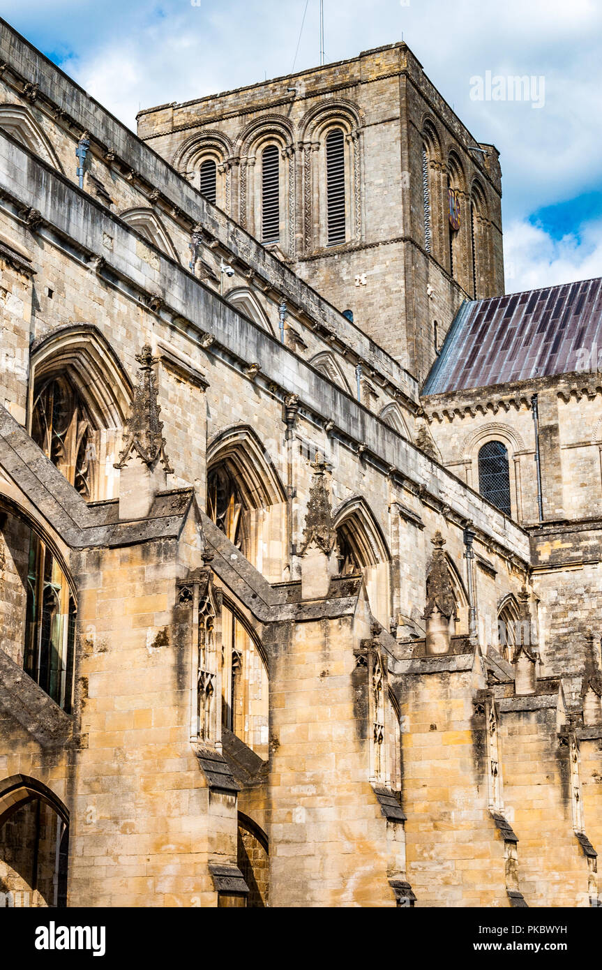 The flying buttresses and tower of Winchester Cathedral, Hampshire, England, UK Stock Photo