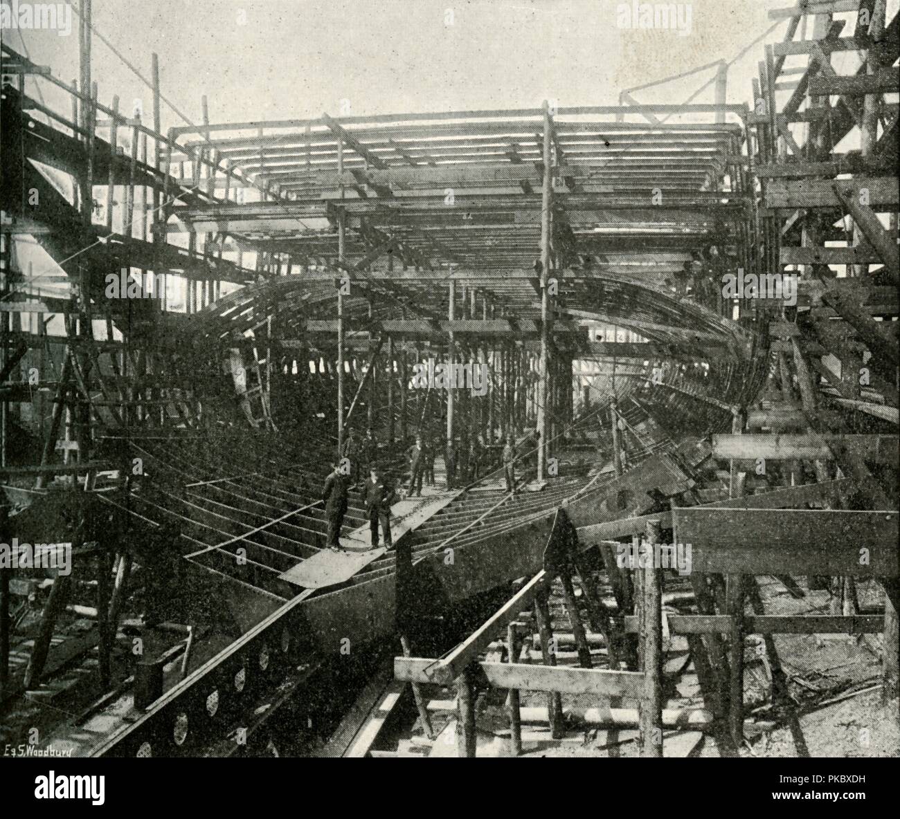 'The Building of a War-Ship: A First-Class Cruiser in Progress at the Thames Ironworks', (c1897). Artist: E&S Woodbury. Stock Photo
