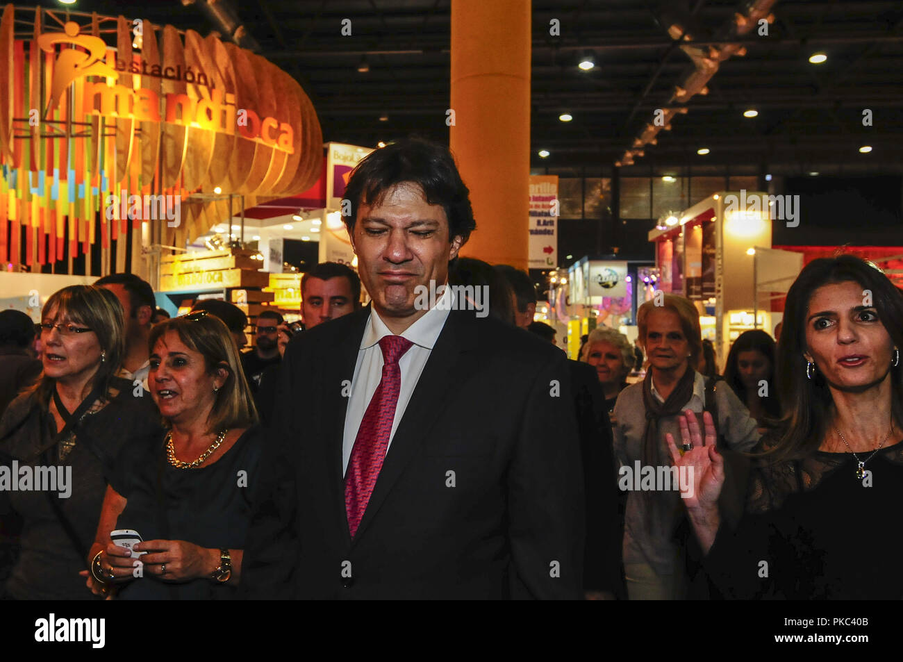 Firmat, Santa Fe, Argentina. 24th Apr, 2014. Fernando Haddad, at the time Mayor of Sao Paulo, with his wife Ana Estela during a visit to Buenos Aires' Book Fair. Haddad has been appointed to replace Inazio Lula da Silva as the PT (Workers Party) Presidential candidate for the upcoming elections. Credit: Patricio Murphy/ZUMA Wire/Alamy Live News Stock Photo