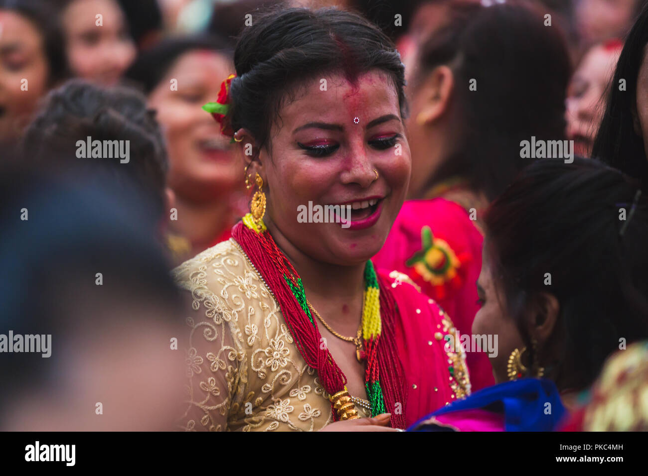 Kathmandu,Nepal - Sep 12,2018: Nepali Hindu Women Dancing at Teej Festival in Kathmandu.Hindu Nepali Women fast and wish for a prosperous life of their spouse and family on this festival.The festivals for women, include dancing, singing, getting together with friends,, wearing red, green or orange clothes, sharing festive foods Credit: Nabaraj Regmi/Alamy Live News Stock Photo