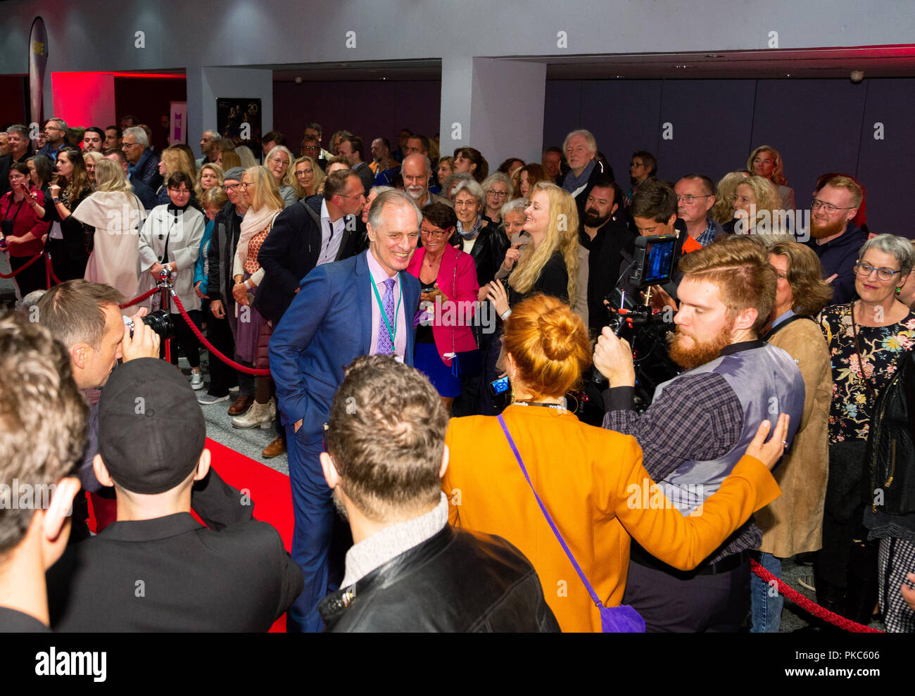 12 September 2018, Lower Saxony, Oldenburg: 12 September 2018, Germany, Oldenburg: Keith Carradine, US actor and Oscar winner, walks past guests on the red carpet at the opening of the 25th Oldenburg International Film Festival. Photo: Mohssen Assanimoghaddam/dpa Stock Photo