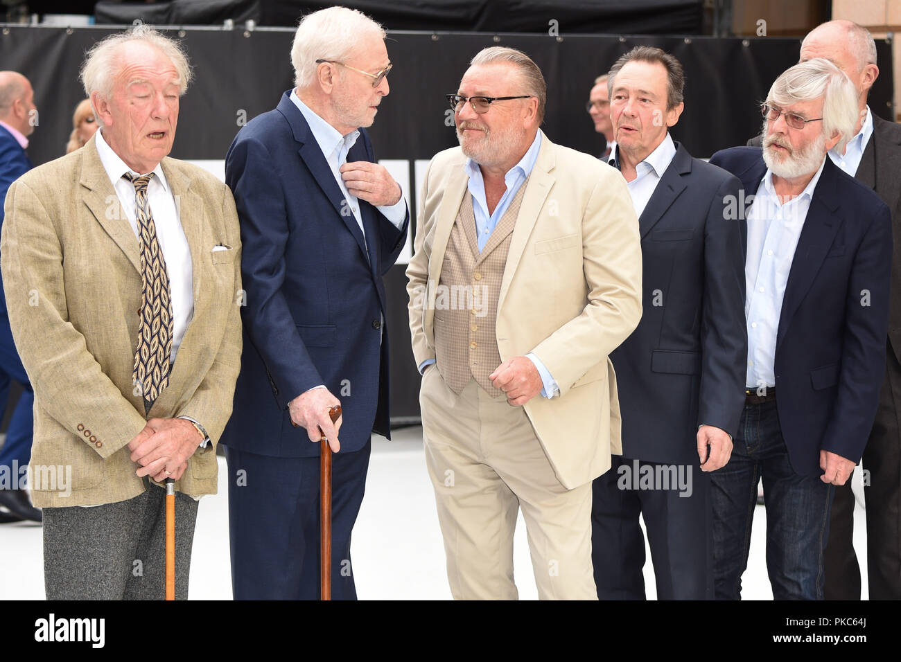 London, UK. September 12, 2018: Charlie Cox, Sir Michael Gambon, Sir Michael Caine, Ray Winstone, Paul Whitehouse, Sir Tom Courtenay & Jim Broadbent at the World Premiere of 'King of Thieves' at the Vue Cinema, Leicester Square, London. Picture: Steve Vas/Featureflash Credit: Sarah Stewart/Alamy Live News Stock Photo