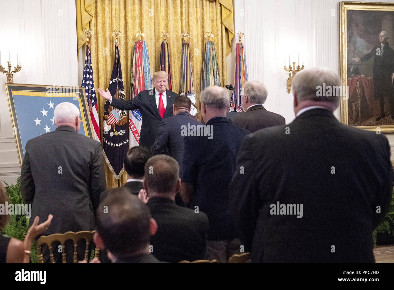 Washington, District of Columbia, USA. 12th Sep, 2018. United States President Donald J. Trump acknowledges the attendance of many Congressional Medal of Honor recipients as he makes remarks at the Congressional Medal of Honor Society Reception in the East Room of the White House in Washington, DC on Wednesday, September 12, 2018 Credit: Ron Sachs/CNP/ZUMA Wire/Alamy Live News Stock Photo