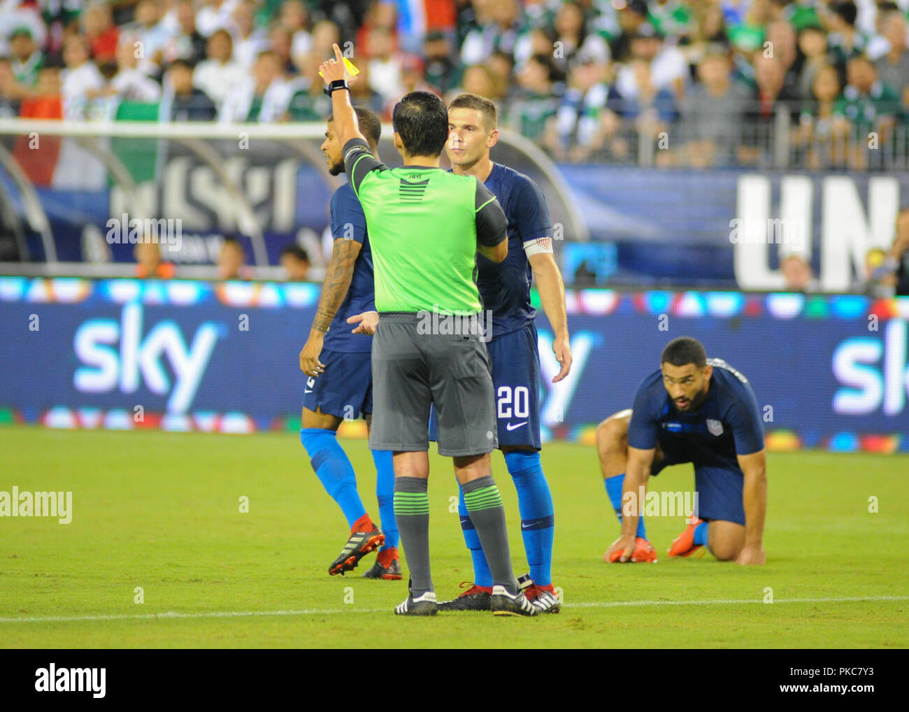 Nashville, TN, USA. 11th Sep, 2018. US Team Captain, Will Trapp (20), discuss the yellow card of teammate DeAndre Yedlin (2), during the International Friendly match between Mexico and USA at Nissan Stadium in Nashville, TN. The US National team defeated Mexico, 1-0. Kevin Langley/CSM/Alamy Live News Stock Photo