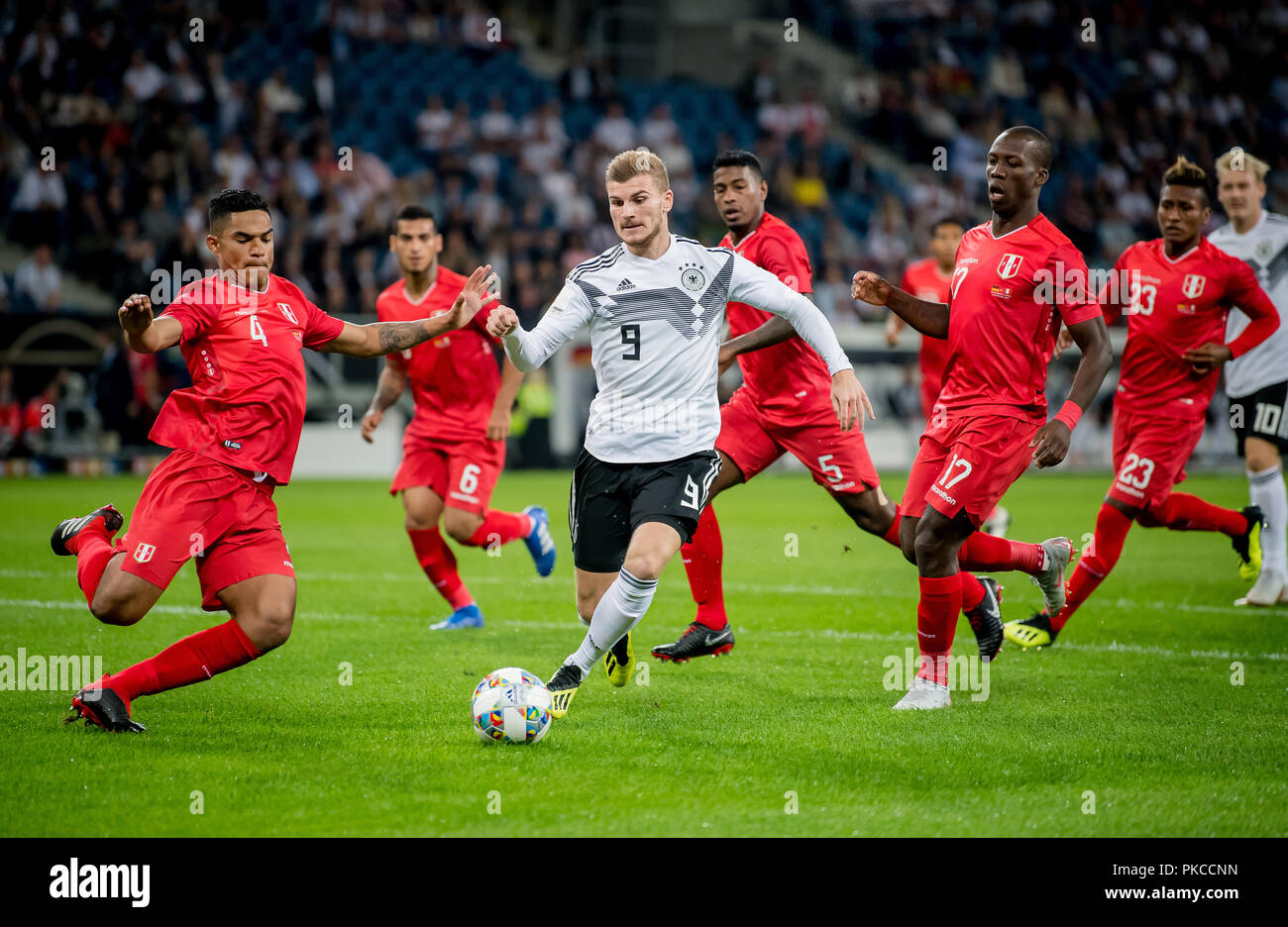 09 September 2018, Baden-Wuerttemberg, Sinsheim: September 9, 2018: Sinsheim, Wirsol Rhein-Neckar-Arena: Football Friendly Match, Germany - Peru: Germany's Timo Werner (white) against Peru's Anderson Santamaria (DFB regulations prohibit any use of photographs as image sequences and/or quasi-video). (NOTE: USE FOR RADIO PICTURES ONLY AFTER CONSULTATION) Photo: Thomas Eisenhuth/dpa-Zentralbild/ZB Stock Photo