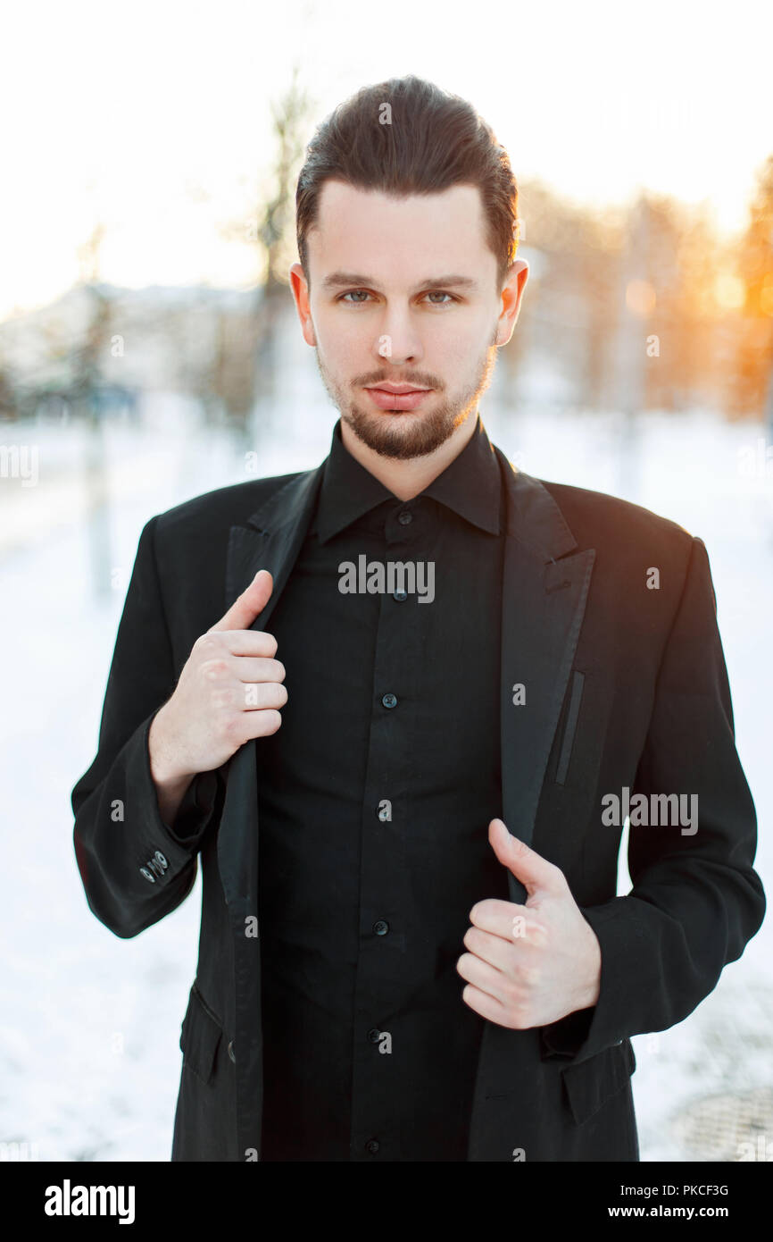 Stylish businessman in suit on sunny city street hi-res stock ...