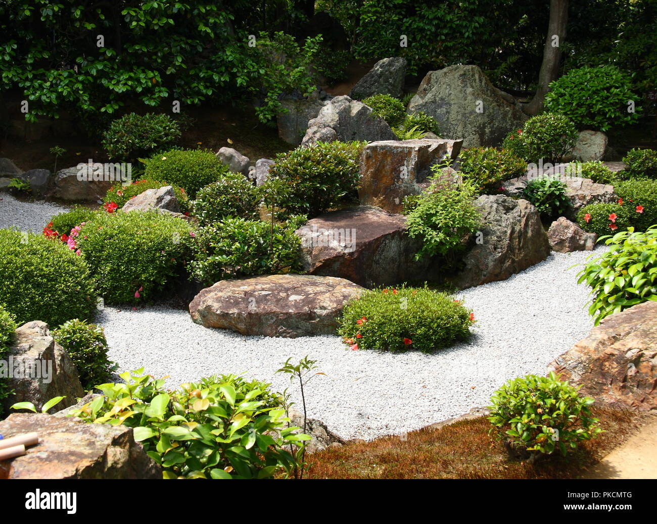 Japanese zen garden in Kyoto with big stones and raked gravel Stock