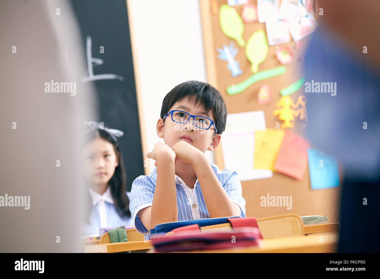 Elementary school students in the classroom Stock Photo