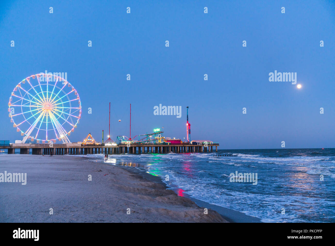 steel pier with reflection at night,Atlantic city,new jersey,usa. Stock Photo