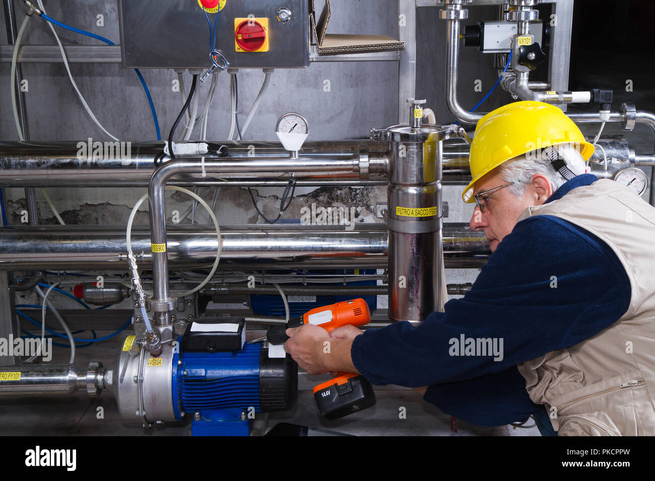 repairman at maintenance work Stock Photo - Alamy