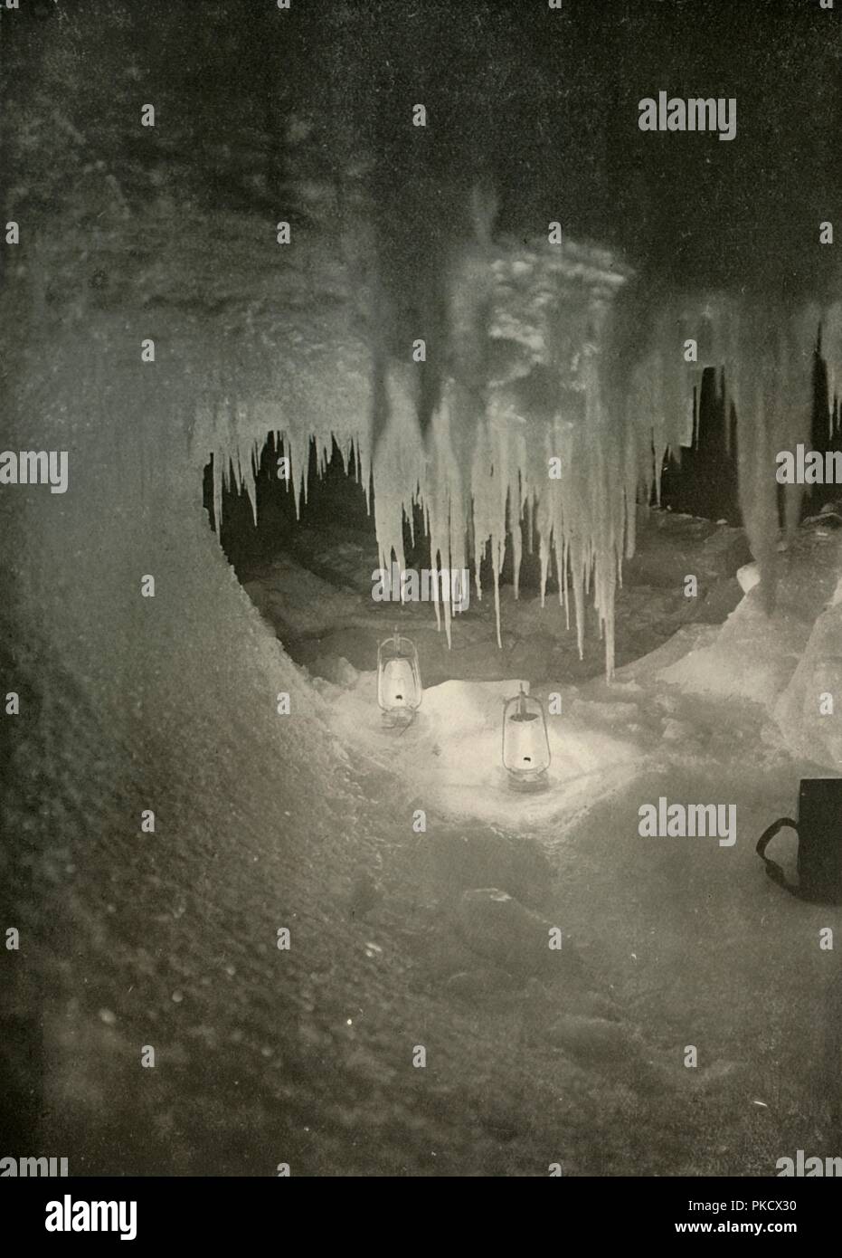 'An Ice Cavern in the Winter. Photographed by the Light of Hurricane Lamps', c1908, (1909).  Artist: Unknown. Stock Photo