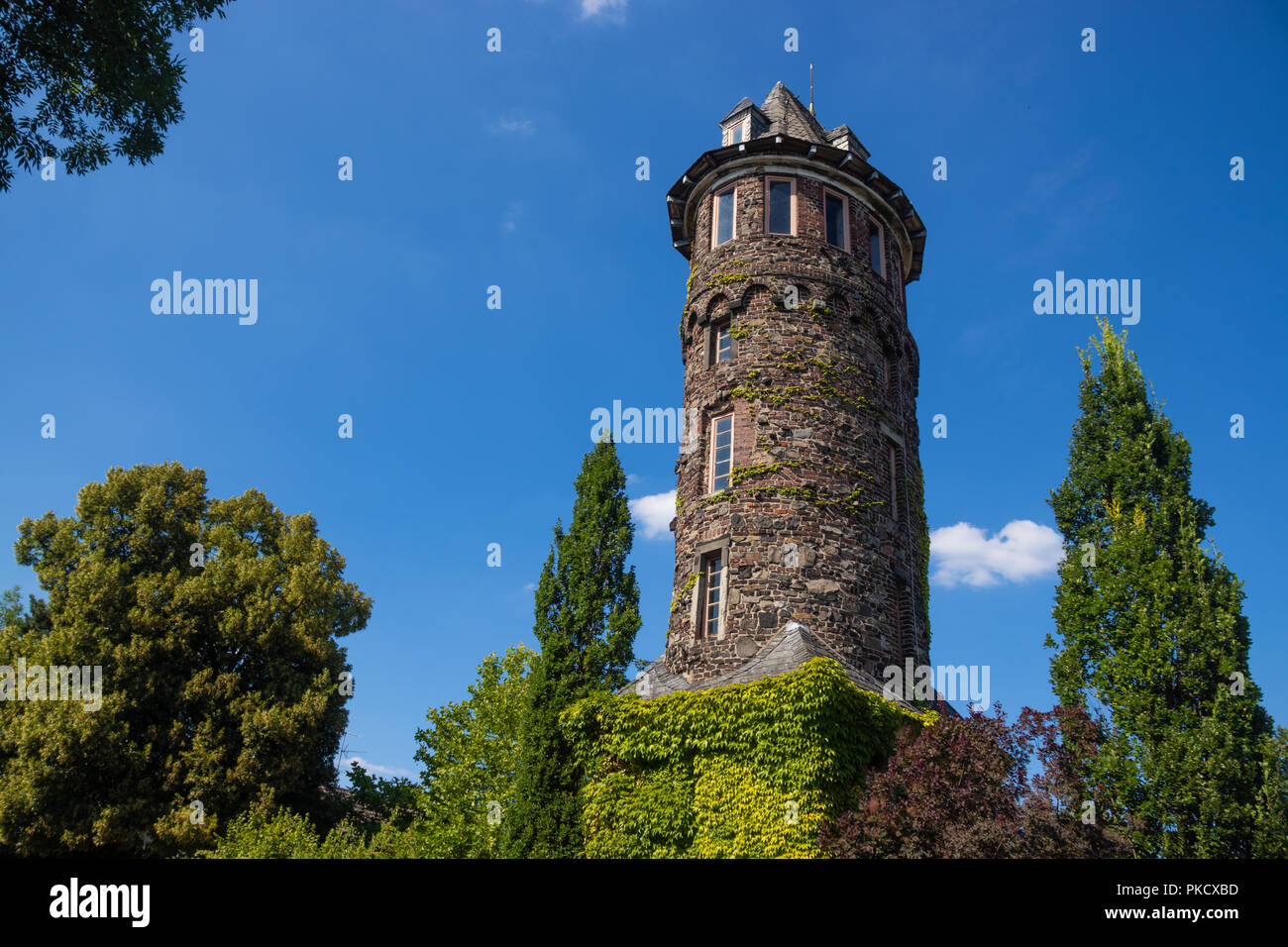 An old tower building next to the Rhine along the Rhine Cycleway, Germany. Stock Photo