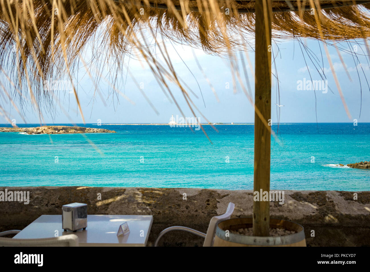 View of the sea of Sardinia by a restaurant. Stock Photo