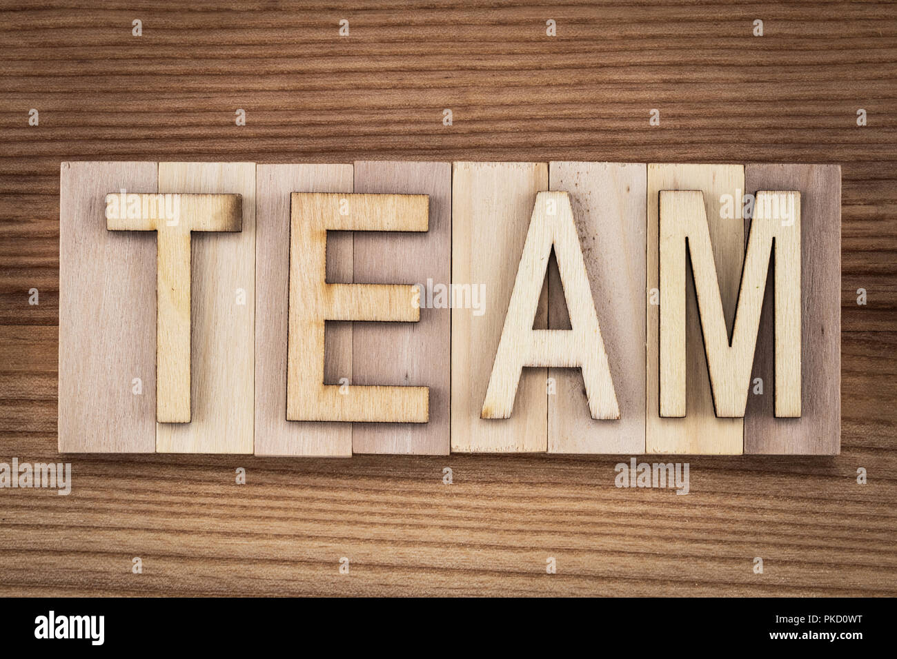 Word hands team people letters hi-res stock photography and images - Alamy