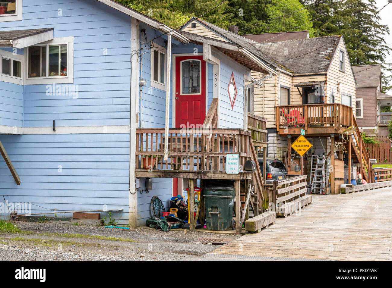 Colourful domestic properties on the slopes above the harbour in Ketchikan, Alaska USA Stock Photo