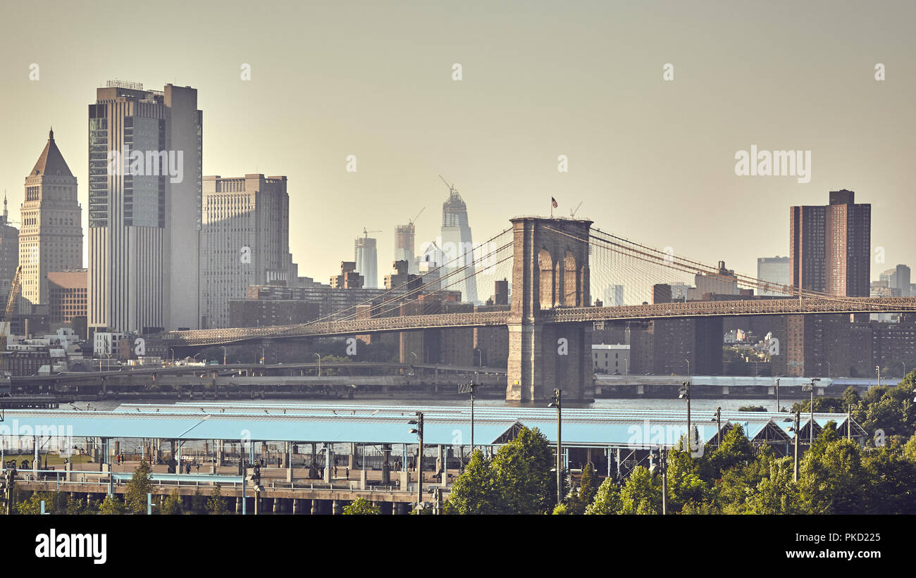 Retro stylized picture of the Brooklyn Bridge and Manhattan skyline, New York City, USA. Stock Photo