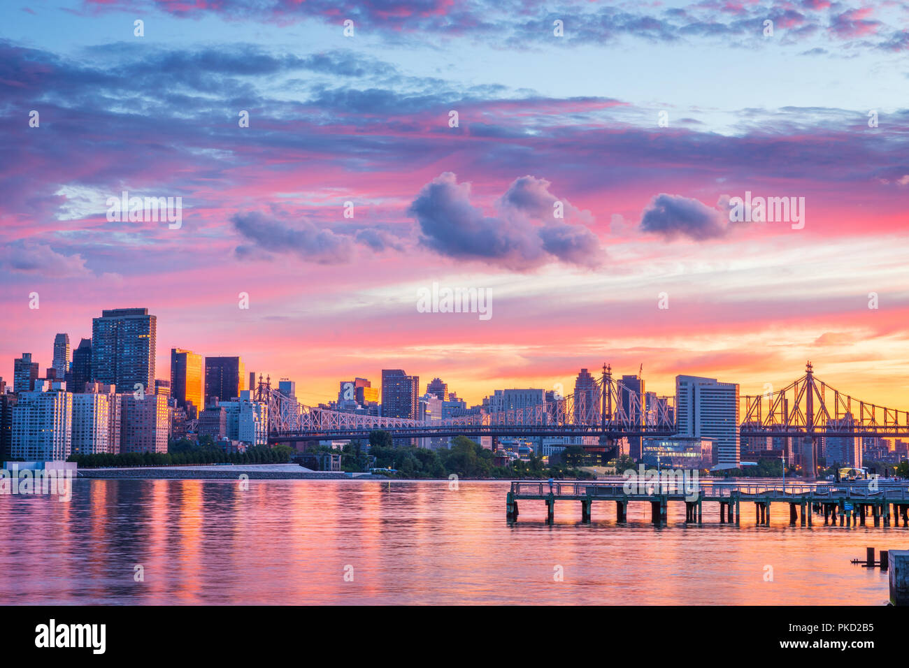 View to Manhattan skyline from the Long Island City at sunrise, this  area along the East River in Queens is known of its great views to Manhattan. Stock Photo