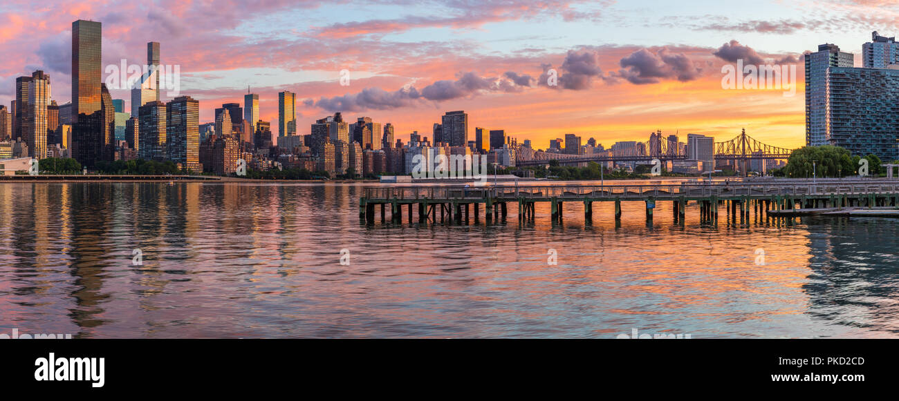 View to Manhattan skyline from the Long Island City at sunrise, this  area along the East River in Queens is known of its great views to Manhattan. Stock Photo