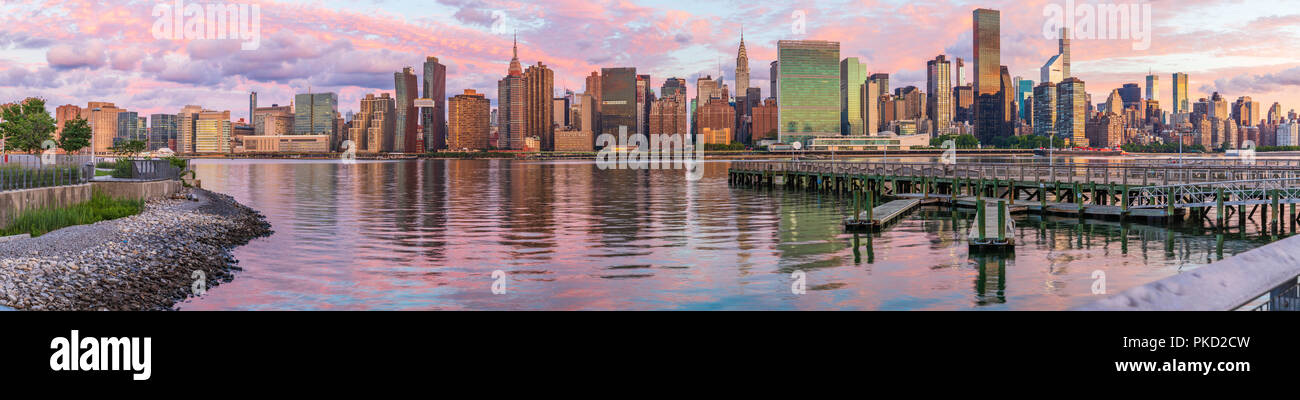 View to Manhattan skyline from the Long Island City at sunrise, this  area along the East River in Queens is known of its great views to Manhattan. Stock Photo