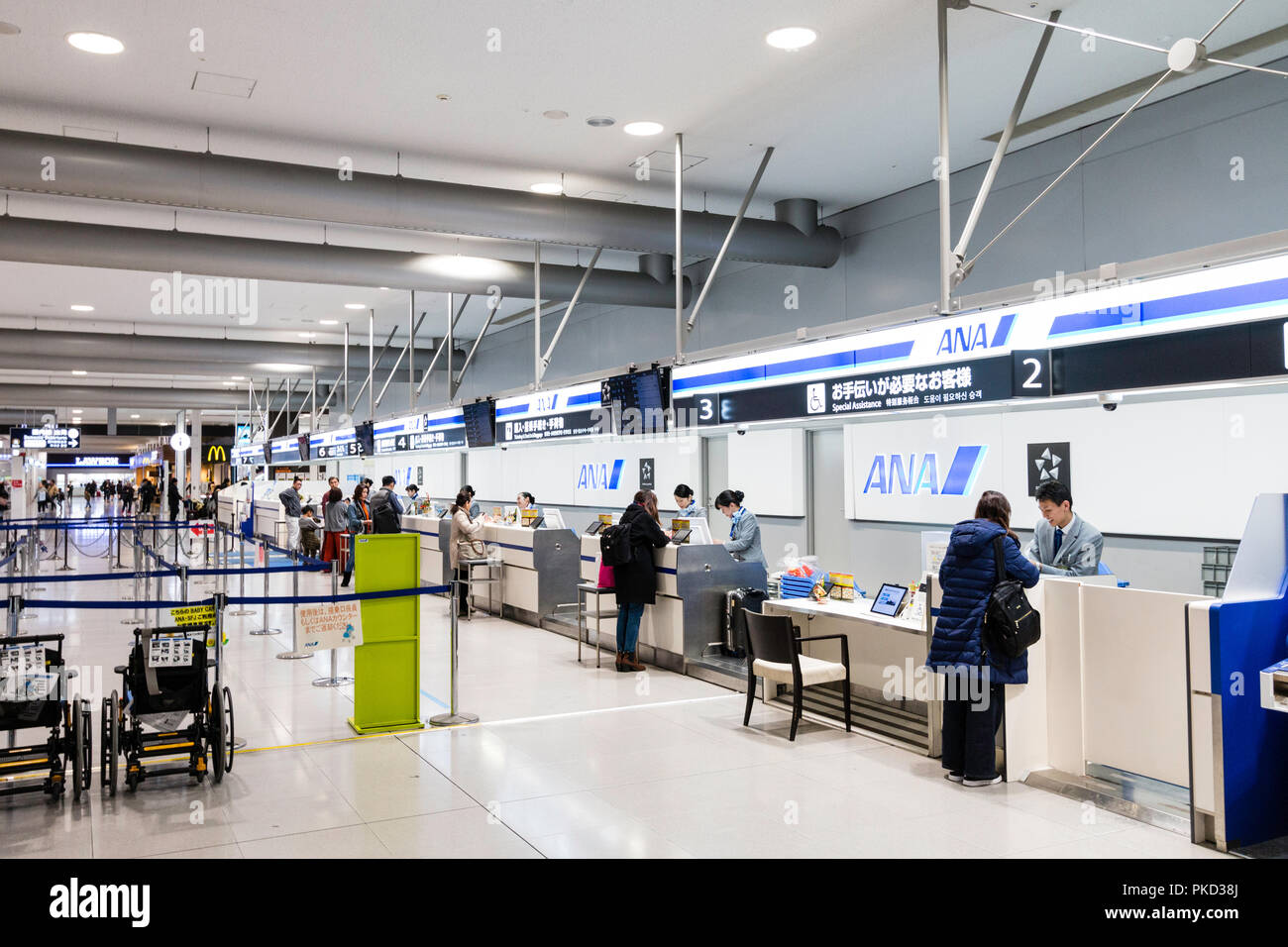 Japan Osaka Kansai International Airport Kix Interior Terminal One Domestic Departures People Checking In At Ana Check In Desks Stock Photo Alamy