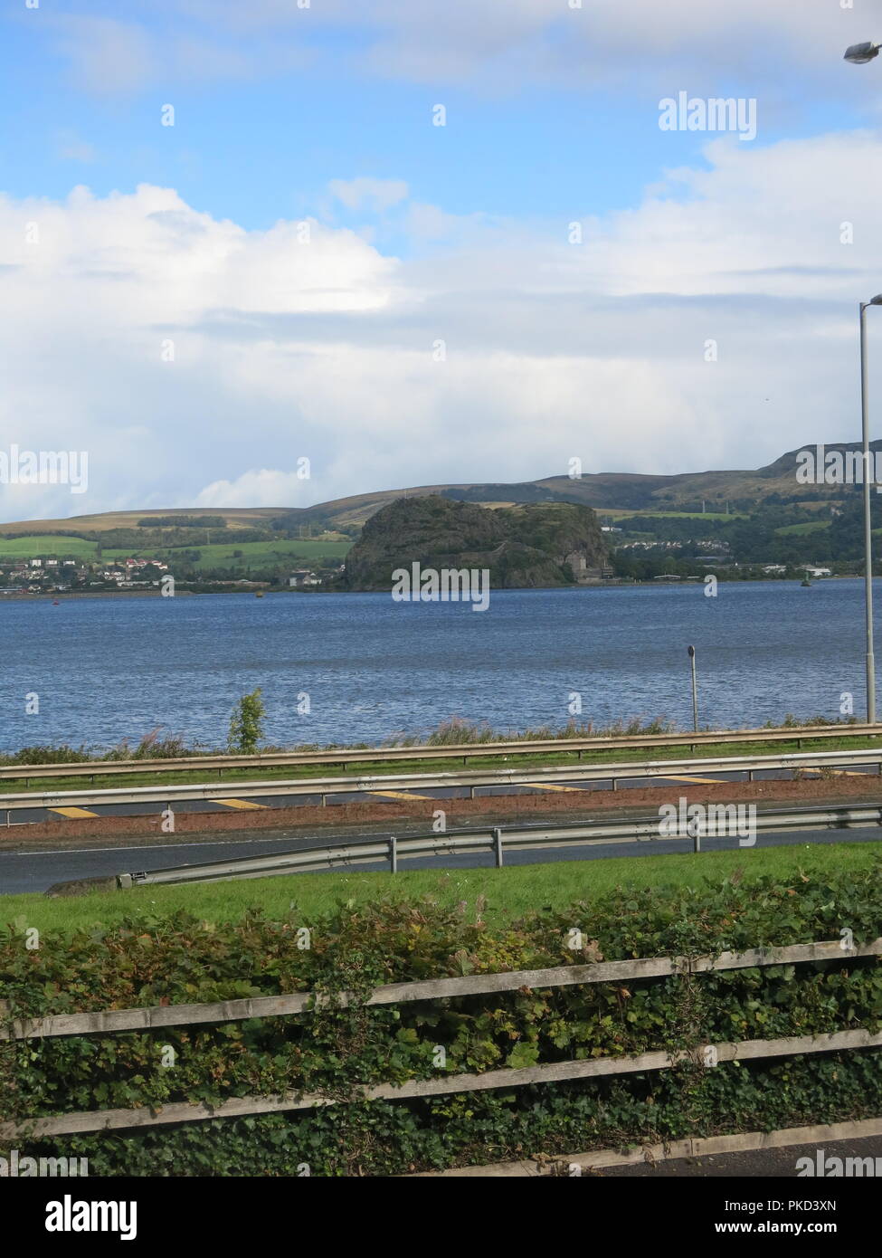 A view of Dumbarton Rock from across the Clyde Estuary on the shores of