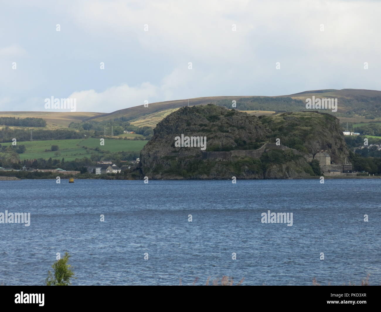 A view of Dumbarton Rock from across the Clyde Estuary on the shores of
