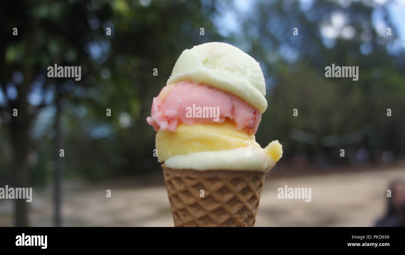 Cheese. Strawberry, And Avocado Flavored Dirty Ice Cream In Focus On A