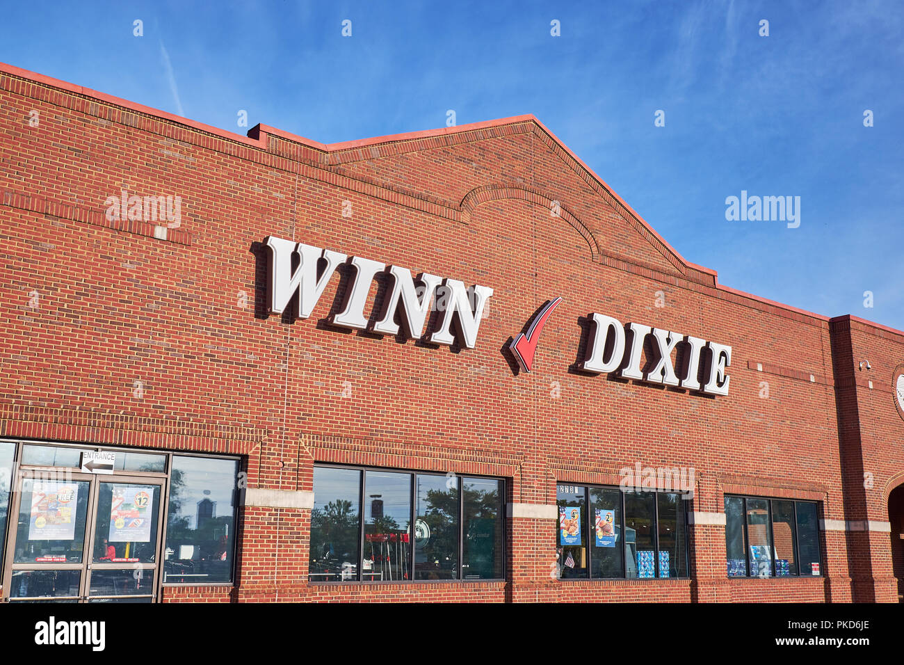 Winn Dixie front exterior entrance to the supermarket or grocery store with the corporate logo sign in Montgomery Alabama USA. Stock Photo