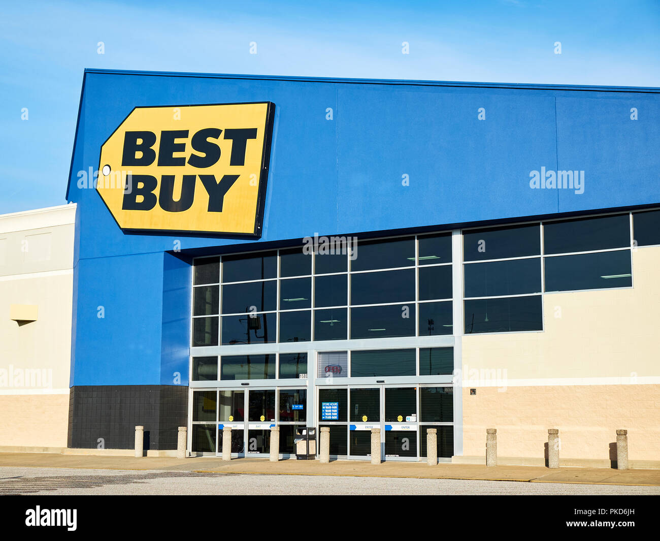 Best Buy front exterior entrance to the consumer electronics big box retail store with the corporate logo sign in Montgomery Alabama USA. Stock Photo