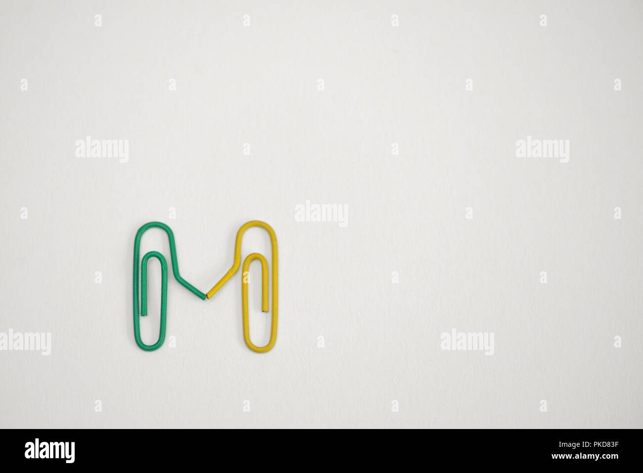 Concept Paperclips sign together on white background Stock Photo