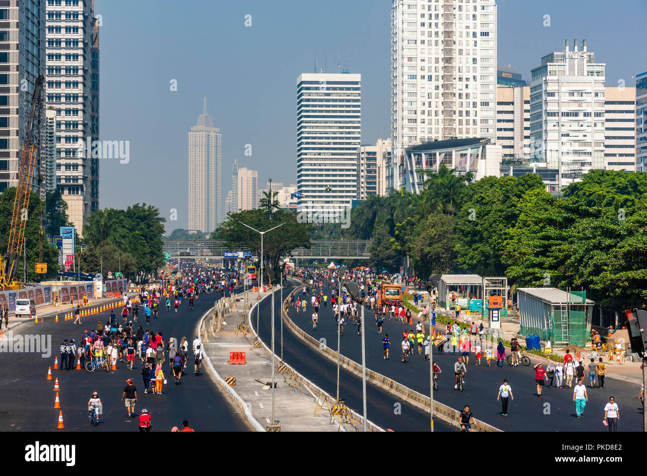 People enjoying the street during the car free day held every Sunday morning, Jakarta, Indonesia Stock Photo