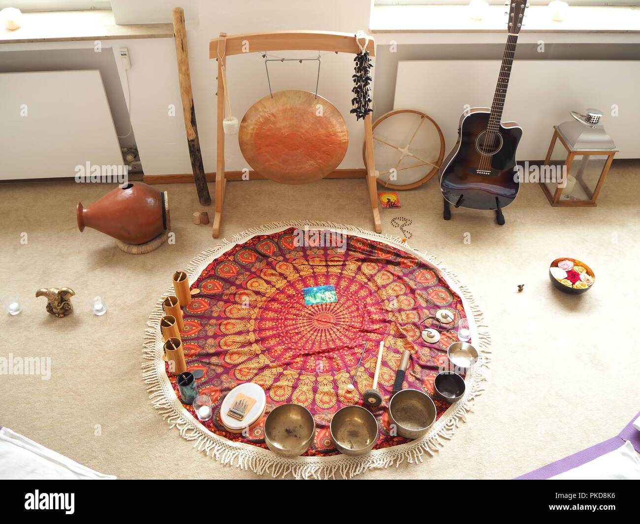 Sound therapy set up with different sound instruments and yoga mats around  Stock Photo - Alamy