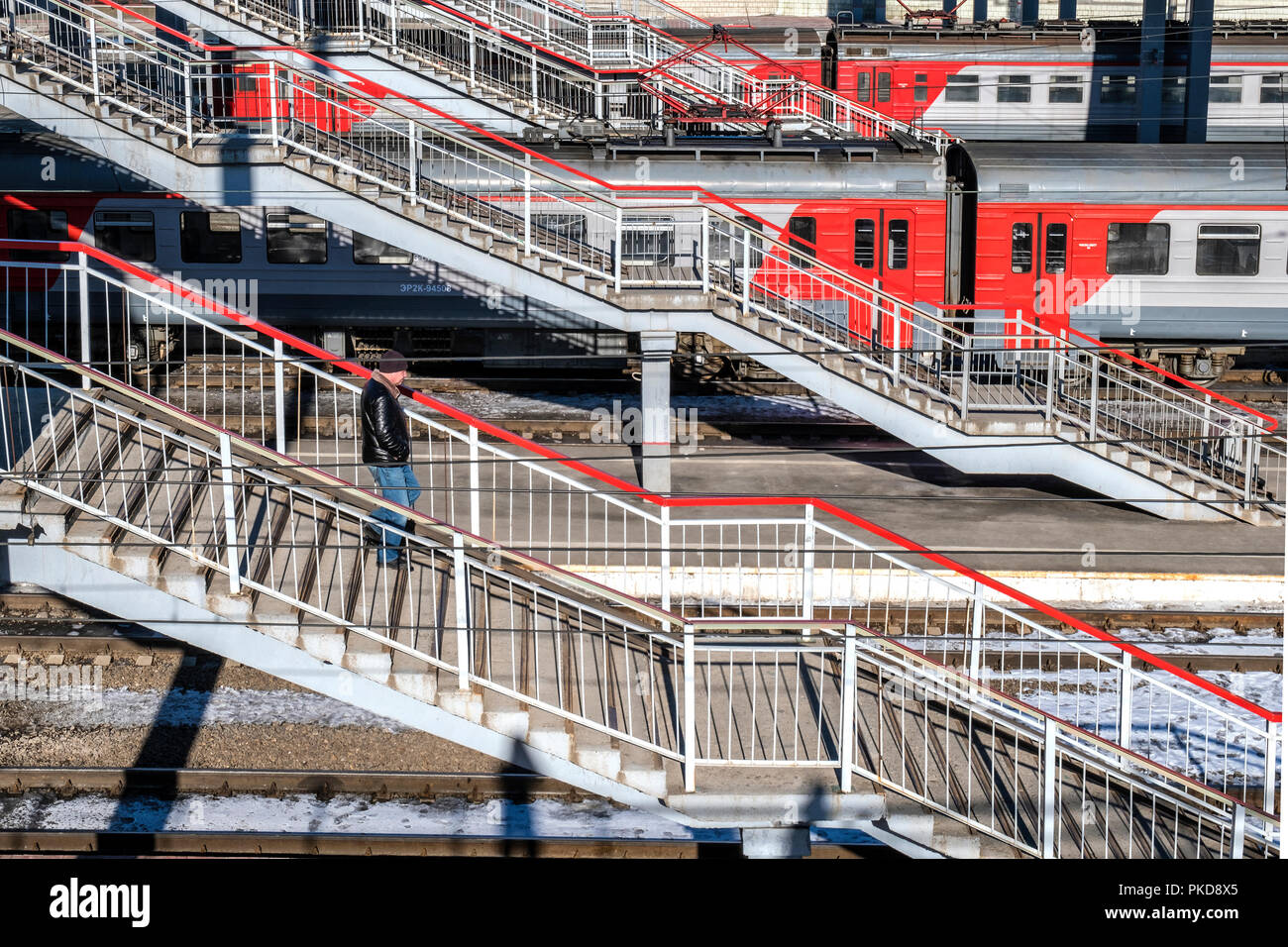 SIBERIA, RUSSIA MARCH 26, 2018 Passenger is landing on the train