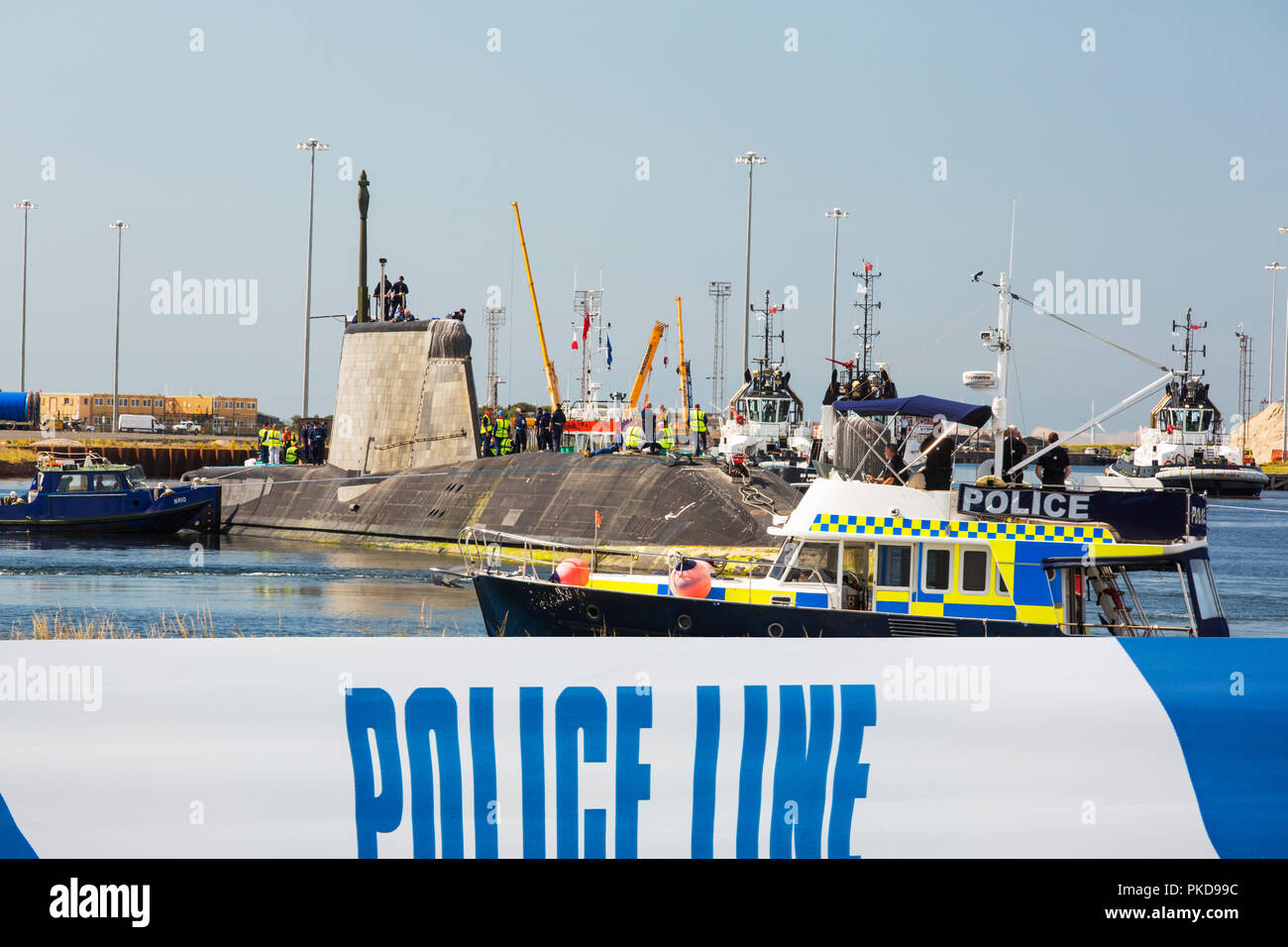 The Artful, an Astute class hunter killer nuclear powered submarine is moved from BAE Systems in Barrow in Furness up to the Faslane submarine base in Stock Photo