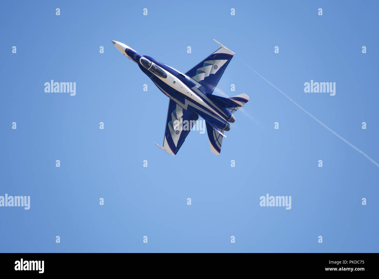 Captain Stefan Porteous of the Royal Canadian Air Force puts his McDonnell Douglas CF-188 Hornet  through an immpressive rehearsal at the RIAT Stock Photo