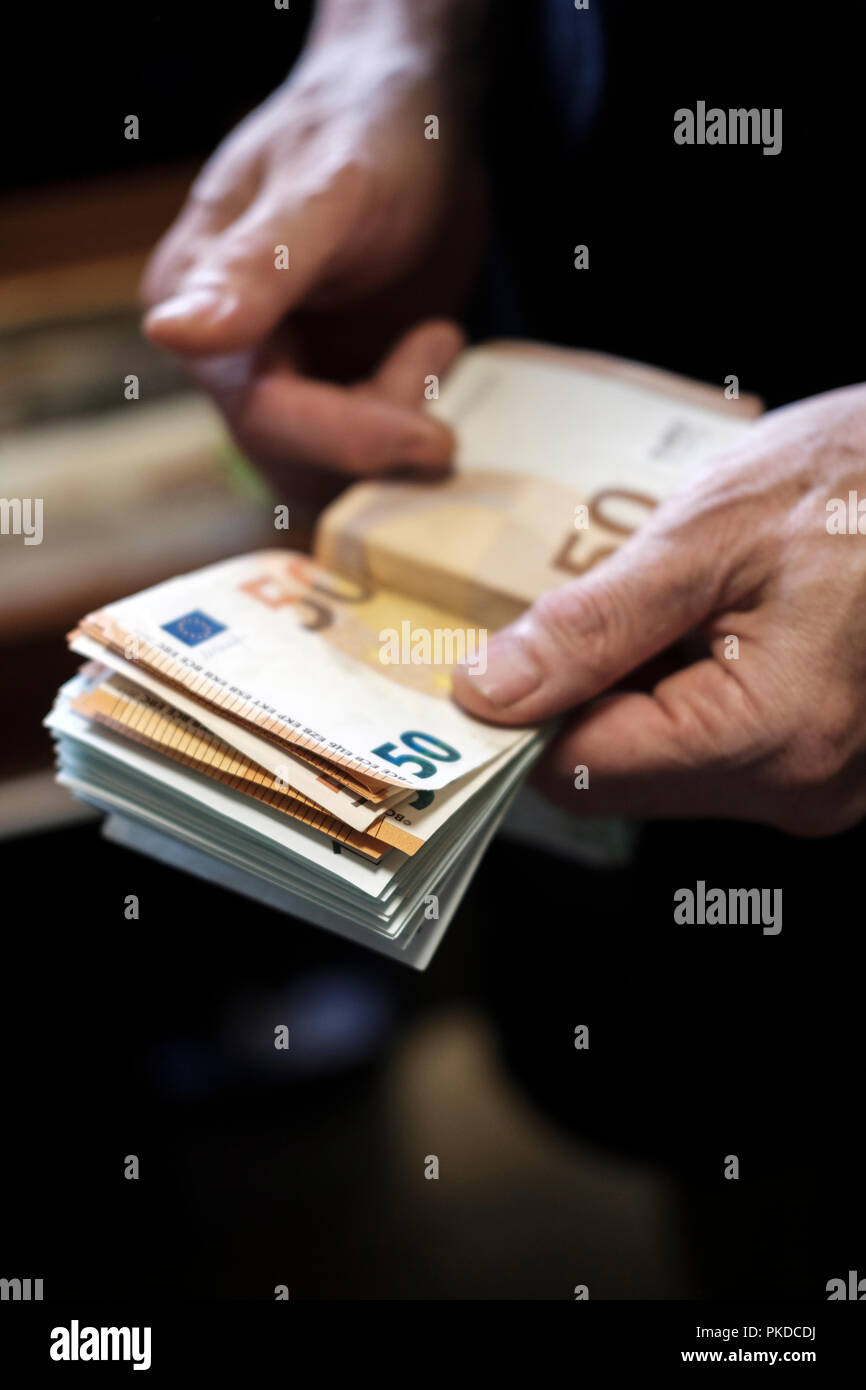 Counting cash-euro banknotes-fifty euros banknotes Stock Photo