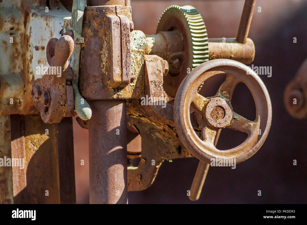 Old industrial valve handle closeup Stock Photo