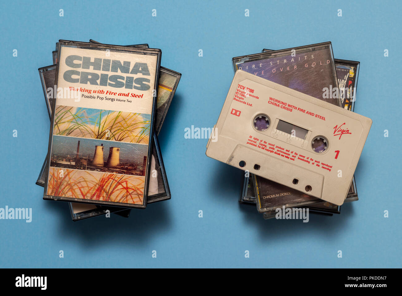 compact audio cassette of China Crisis, Working with Fire & Steel album with art work. Stock Photo