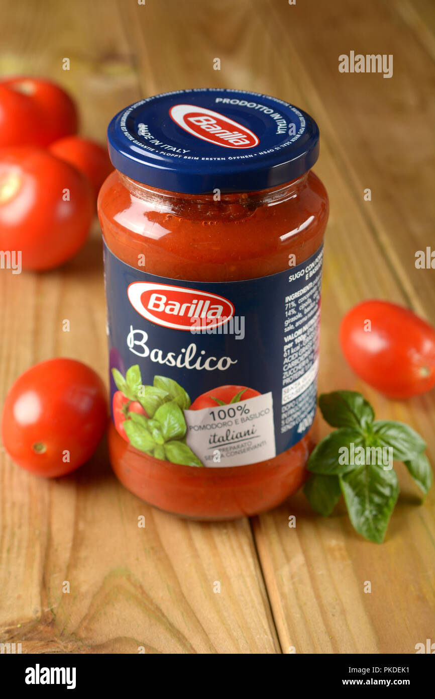 glass jar of tomato sauce with basil - Italian industrial product - for  editorial use only - closeup Stock Photo - Alamy
