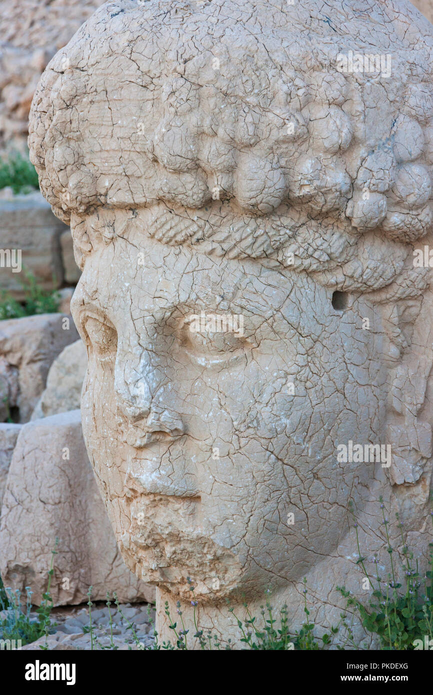 Statue of head at sunrise on the west side of the mountain, Mt. Nemrut