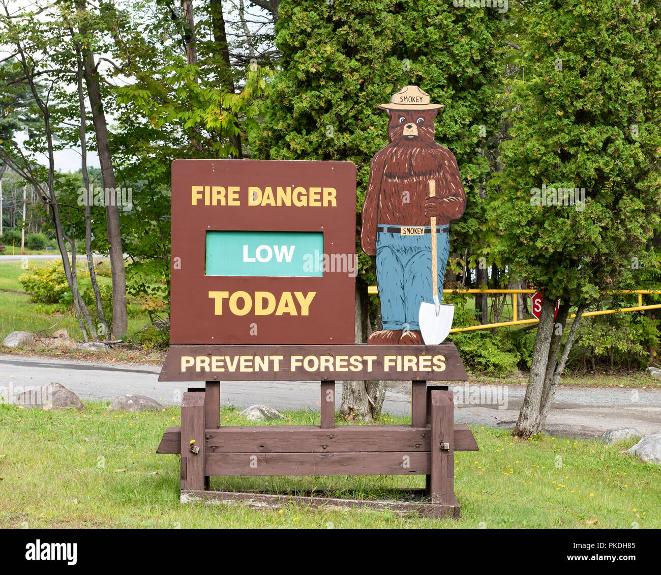 Fire Danger Today sign with Smokey Bear in the Adirondack Park, NY USA Stock Photo