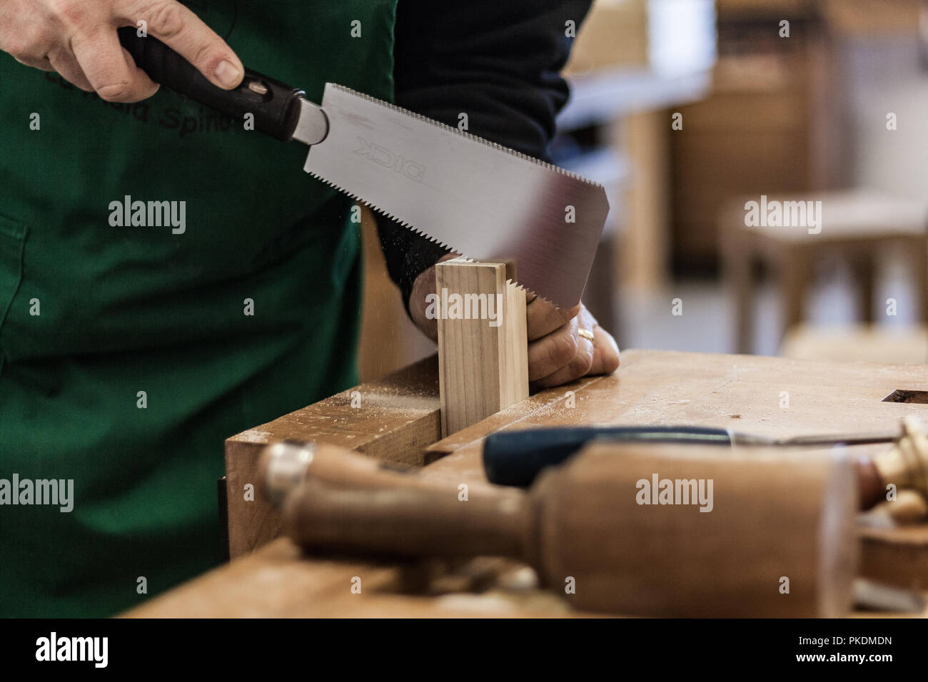 Professional store in Italy, focus on hands and working tools